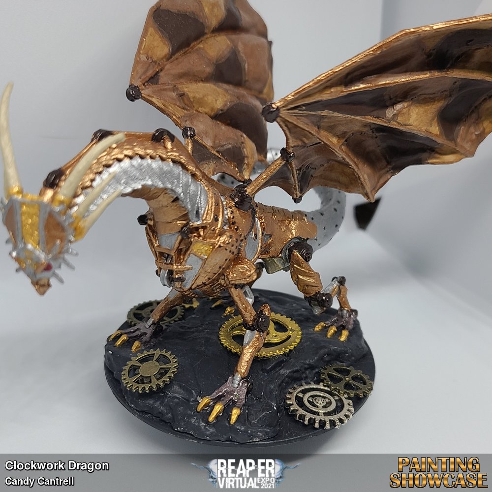 I painted this for a competition at my local gameshop and it won the prize for the beginner category. It was decided by the stores staff and I couldn't have been more excited! I had only started painting a couple months before this contest which took place in July 2020. I went with a Steampunk theme and opted for a patchwork leather look for the wings (featuring Reaper Paints Colors). I picked up miniature painting while Covid quarantine was happening as a way to help me relax from my essential retail job.