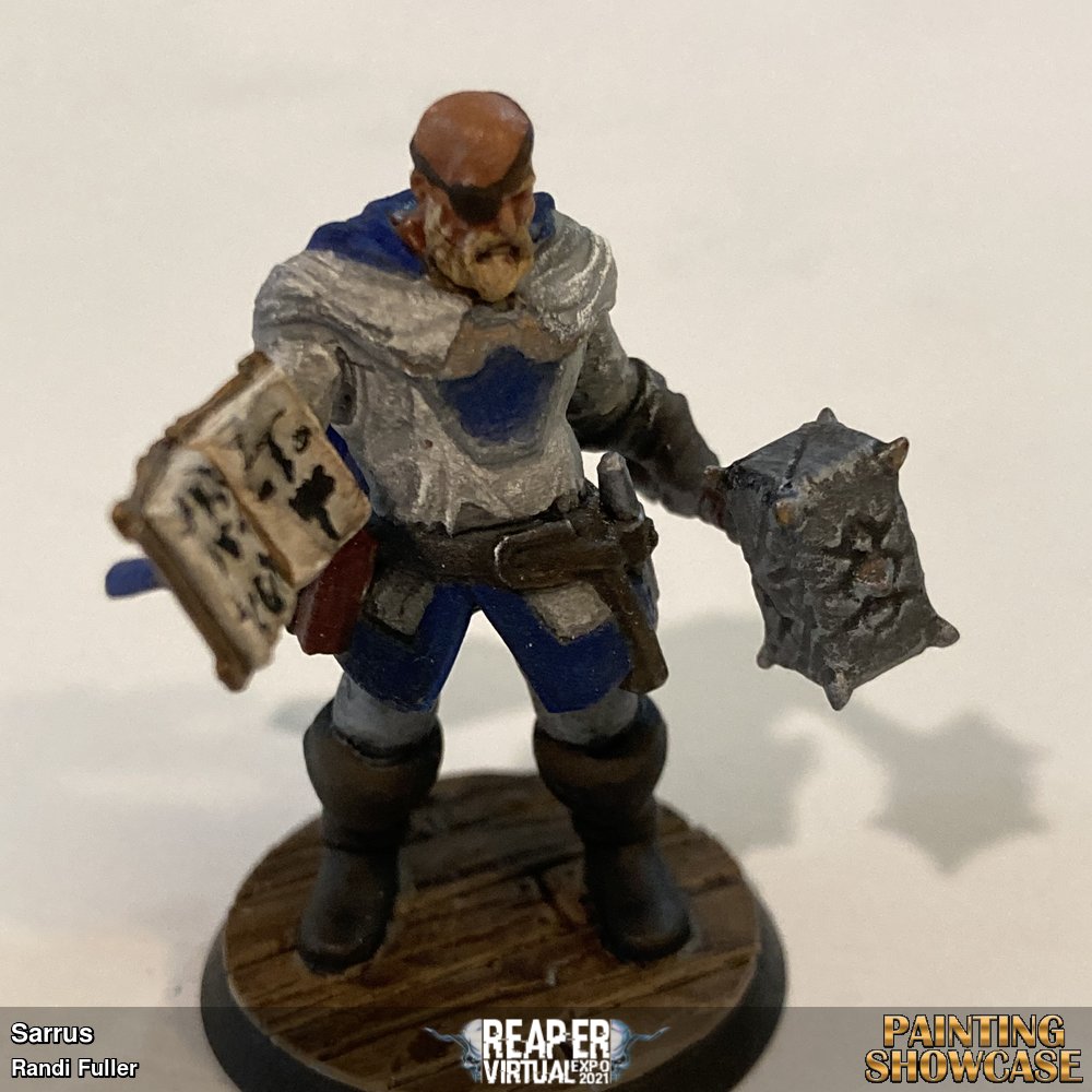 I painted this for my husband's very first D&D tabletop experience.  He's a war cleric of Tyr.  While not a Reaper mini, I only used Reaper paints (which I love).  What better way to encourage a good first experience than to start it off with a rad looking mini?  I hope he likes it :)