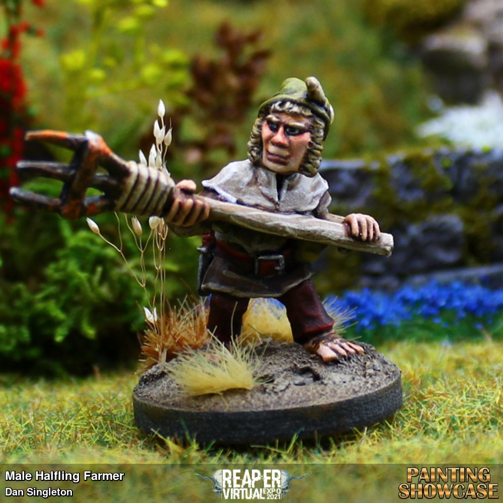 This is the male from the Halfling Farmer's set (SKU: 03729) which I'd repurposed as a Halfling Gardener for my hobbit hole build.  I was quite pleased with how the face turned out on this one, I'd just started experimenting with glazes. 