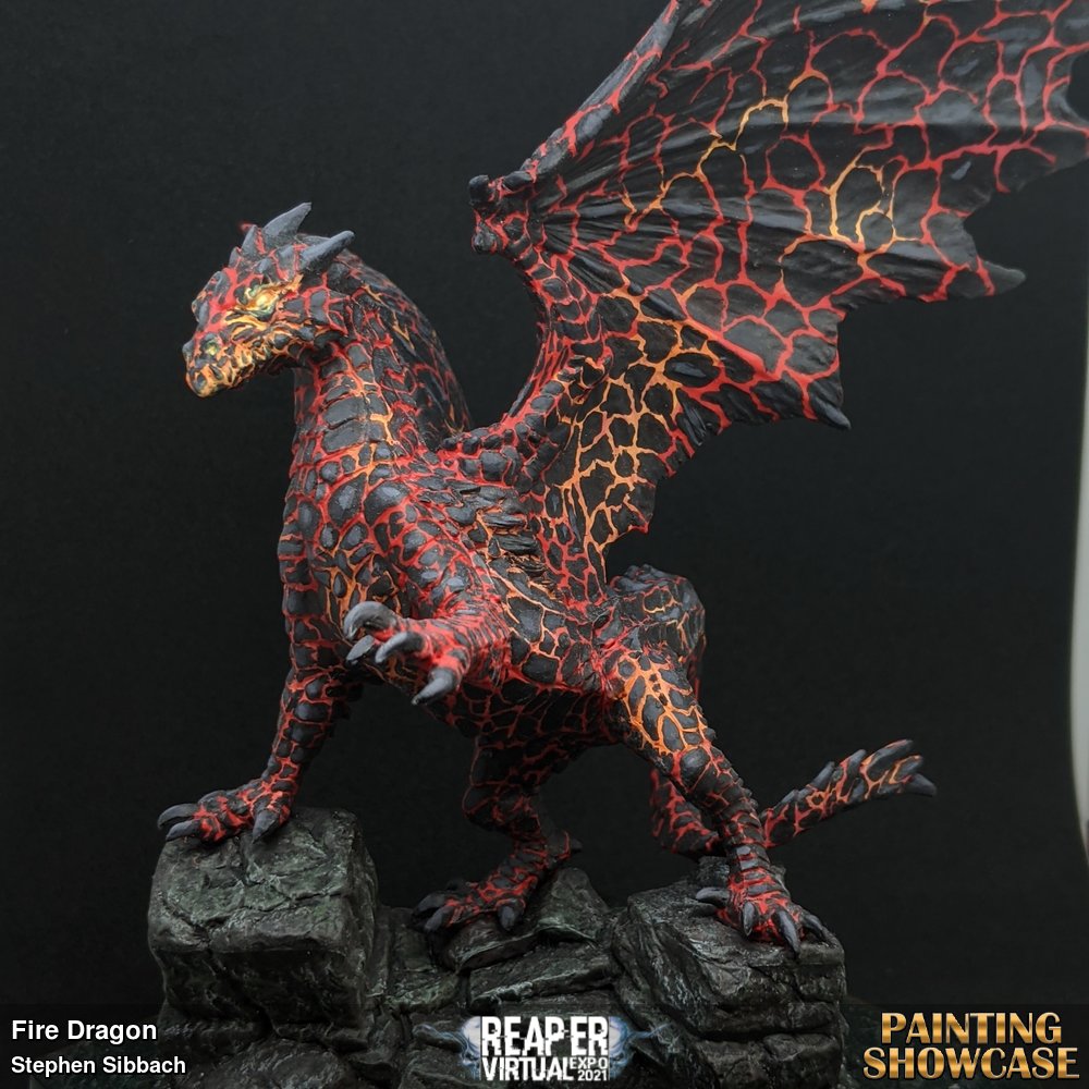 Kyphrixus painted as a Fire Dragon from Dragonlance. The dragon was painted in varying shades of red and yellow and the cooled plates were done in freehand. The whole piece was put on a resin water base.