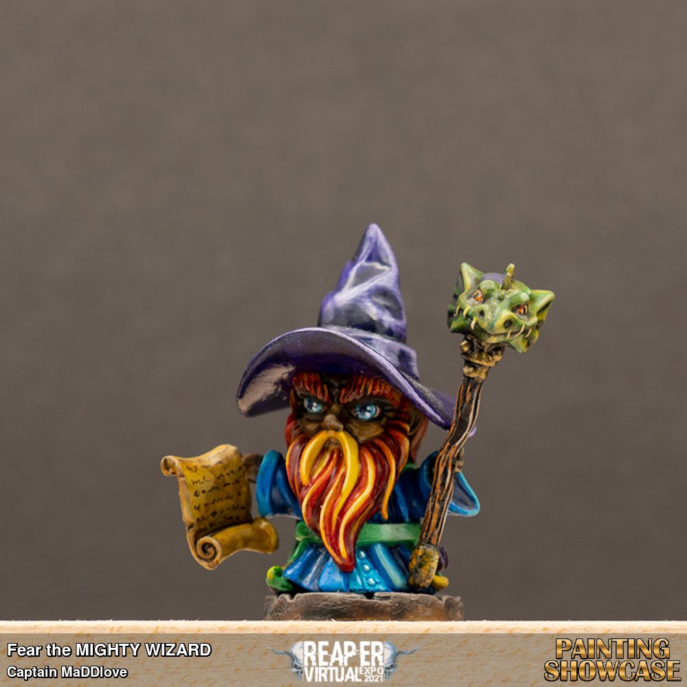 This Reaper Bones 4 kickstarter wizard has his CHIBI eyes painted in the human style eye. The body of the wizard is painted with mostly Vallejo but includes a variety of inks by Daler-Rowney and a pallet of tones by Army painter. He is finished in a high gloss varnish by Liquitex. 